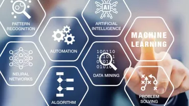 A person pointing at a hexagon marked 'Machine Learning' surrounded by related tech terms.