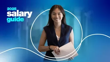 Salary guide 2025 woman holding paper