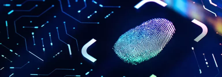 Digital fingerprint on a futuristic screen with circuit patterns.
