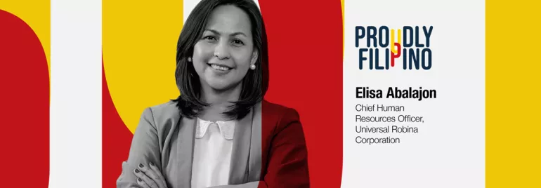 Portrait of a woman with a 'Proudly Filipino' sign in the background.