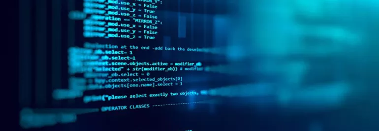 Close-up of computer code on a screen, showing various programming commands and functions.