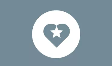 White star inside a heart icon on a grayish-blue background.