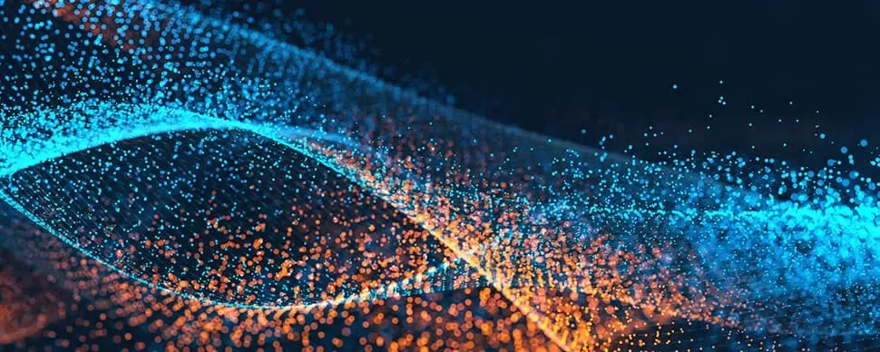 Abstract digital wave of glowing blue and orange particles.